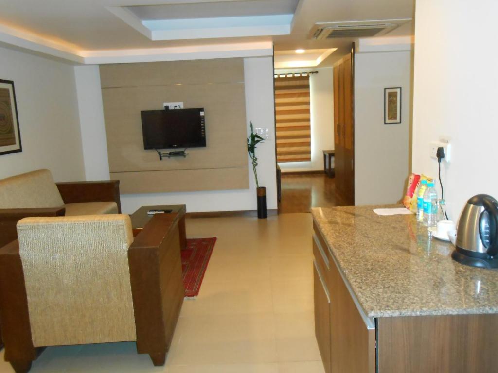 Brunton Heights Executive Suites Бенґалуру Номер фото