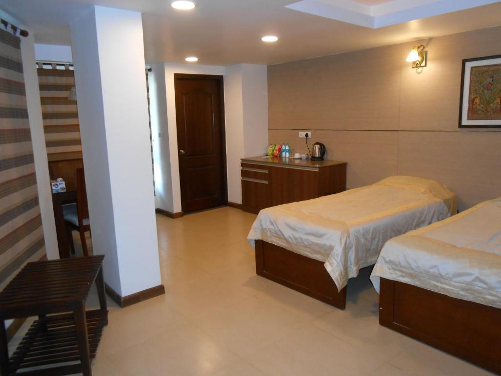 Brunton Heights Executive Suites Бенґалуру Номер фото