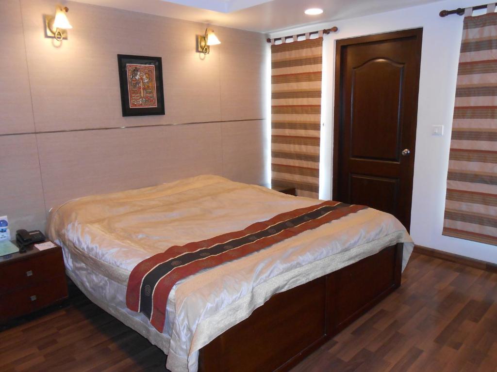 Brunton Heights Executive Suites Бенґалуру Номер фото